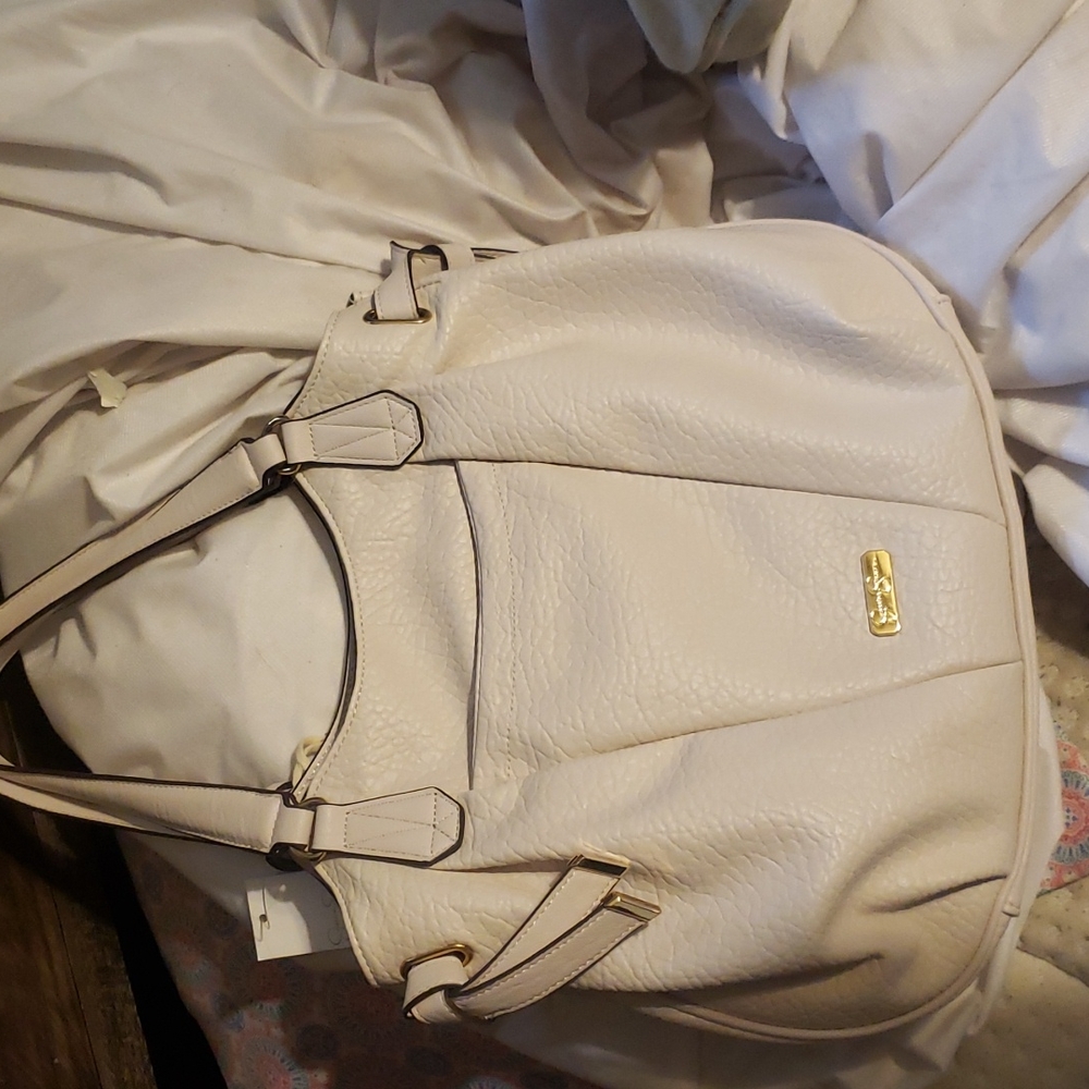 Cream and gold Jessica simpson purse new with tags